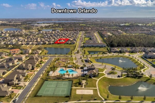 Aerial view of residential neighborhood in Winter Garden, FL, featuring multiple ponds, community amenities including a pool and tennis courts, and highlighted property location near Downtown Orlando.
