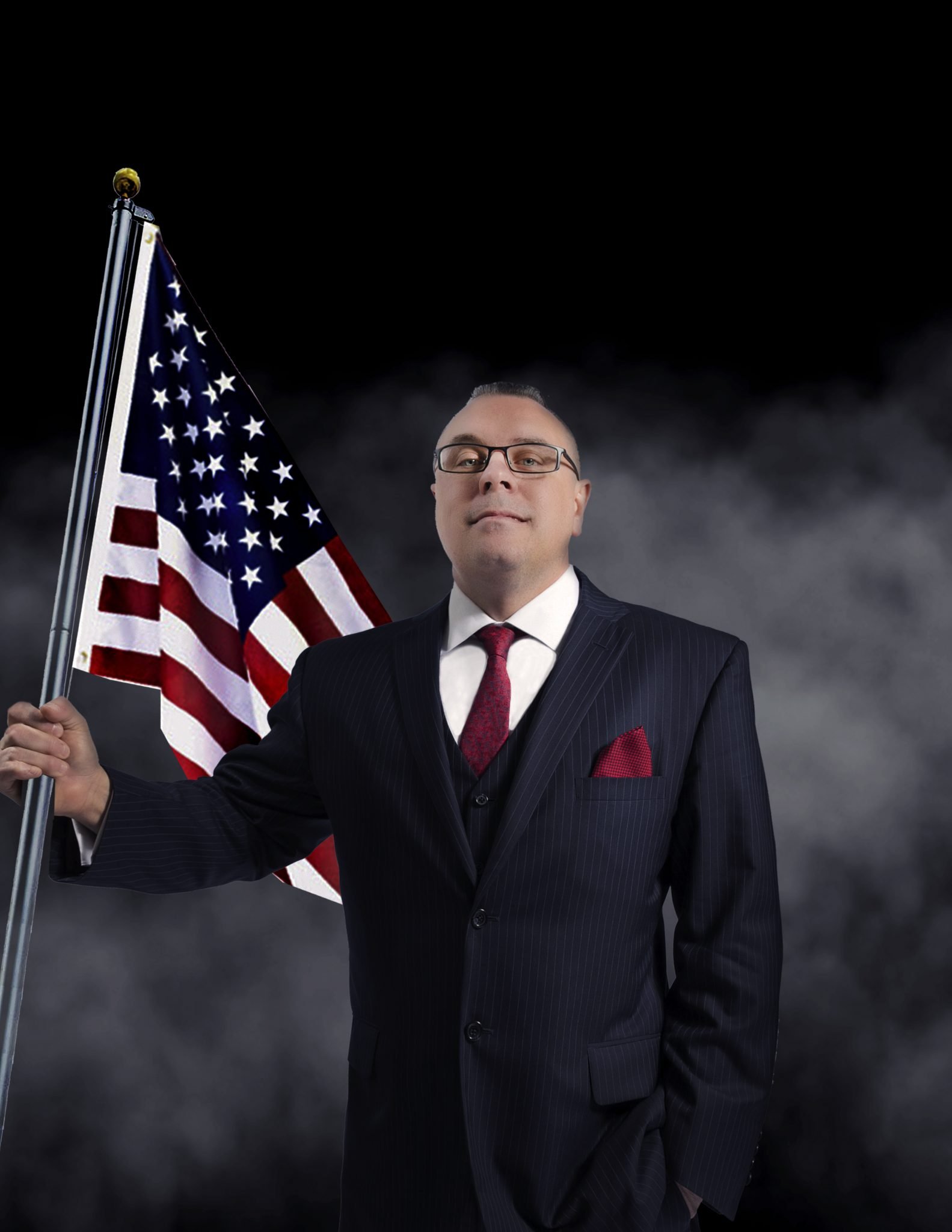 Ron The Realtor in a formal suit holding an American flag, symbolizing patriotism and professionalism in the Orlando real estate market.