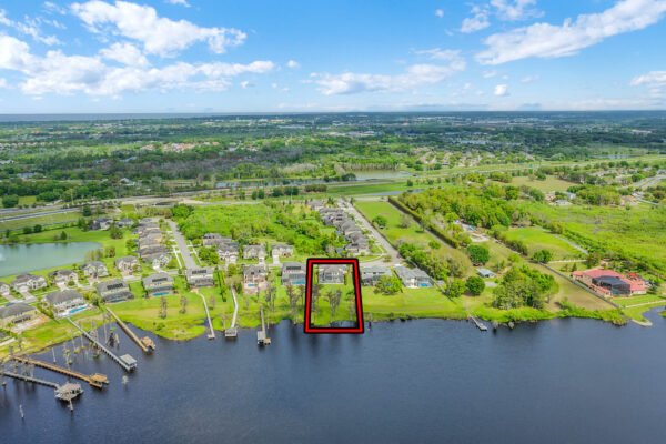 Aerial view of Lake Roberts, highlighting a lakefront property at 1837 Lake Roberts Landing Dr, surrounded by residential areas and lush greenery in Winter Garden, FL.
