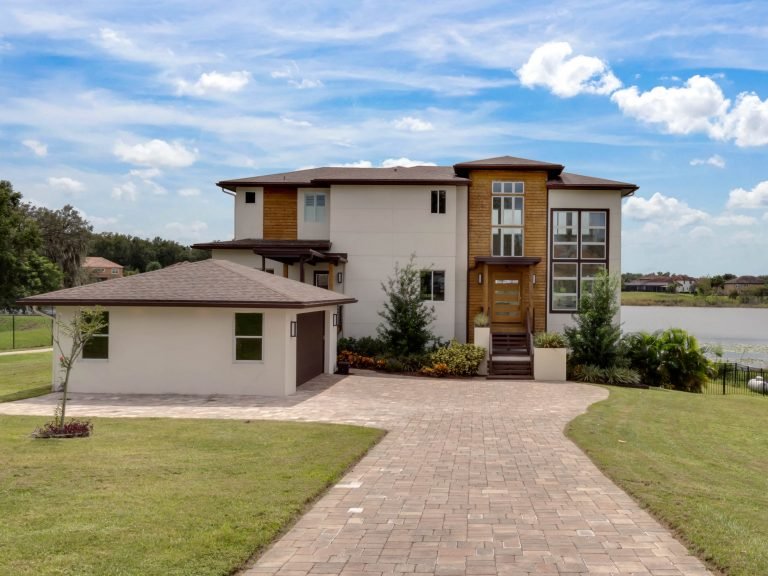 one of a kind custom contemporary masterpiece with over feet on the shore line of private lake fischer, lake coventry court gotha fl