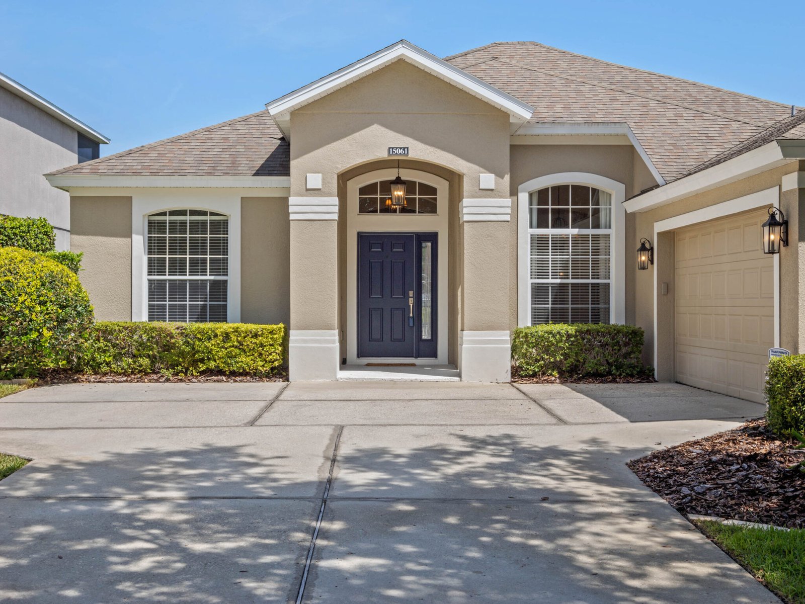 recently remodeled one story automated pool home on premium lot on quiet cul de sac street with peaceful views of retention pond and post card sunsets behind the 24/7 man guarded entrance of stoneybrook west, spinnaker cove lane winter garden fl