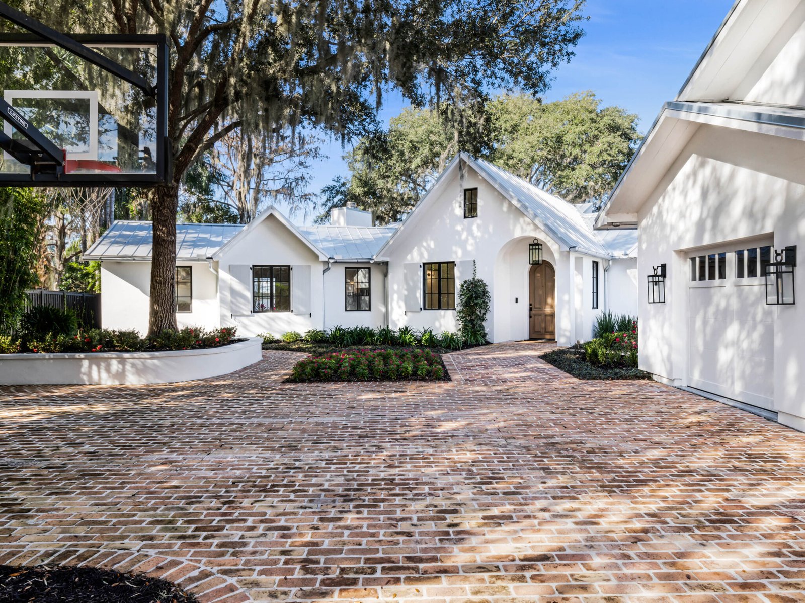 welcome to forest street in picturesque downtown windermere, situated on arguably one of the best waterfront lots on the butler chain, forest street windermere fl